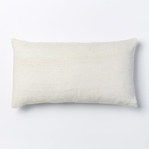 white lumbar pillow